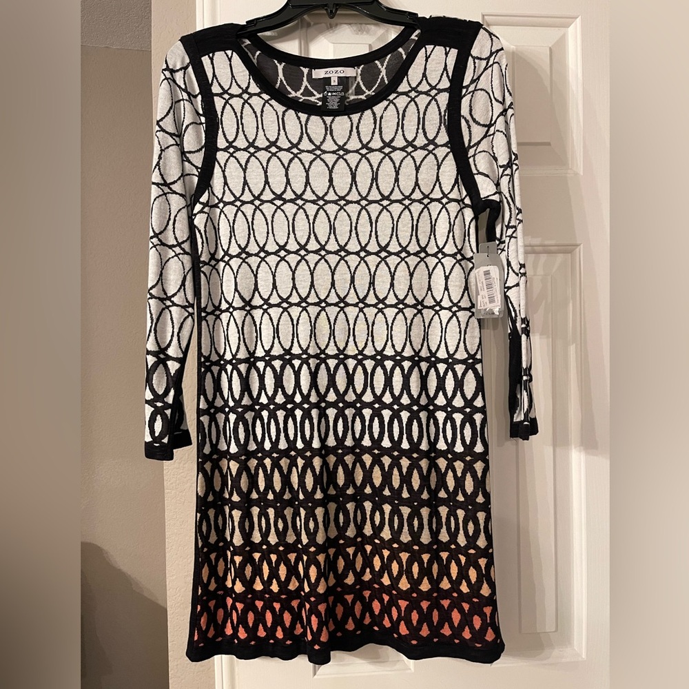 Beautiful NWT geometric print dress. Lovely dress for any occasion.